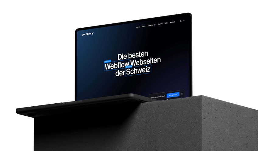 A notebook mockup displaying a website